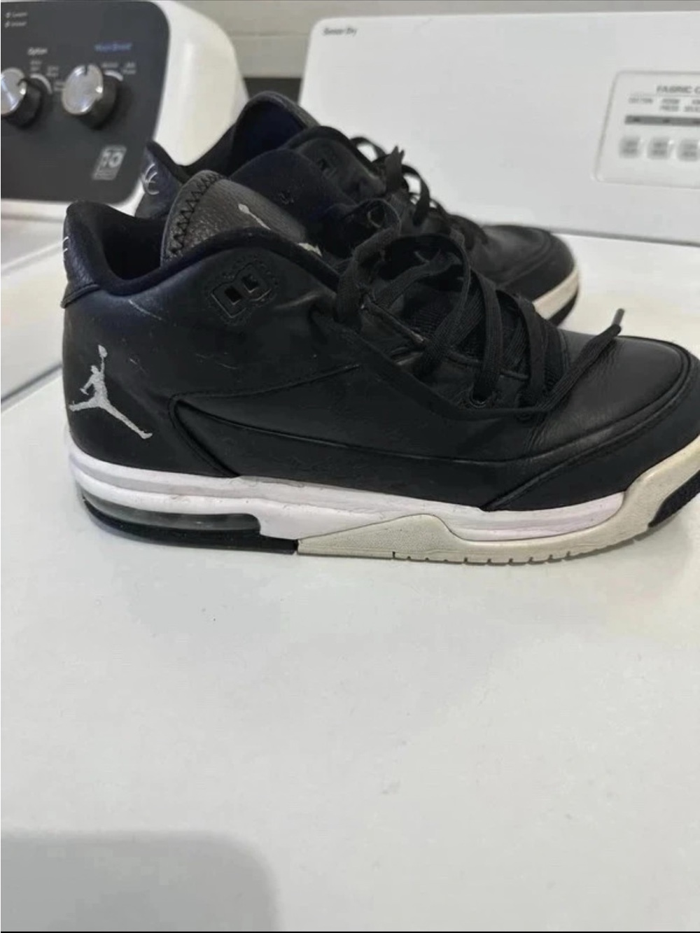 Jordan Men's Black and White Mid-Top Sneakers
